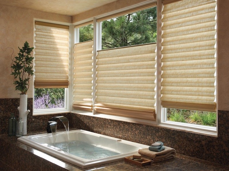 Vignette® Modern Roman Shades open from the bottom and from the top.