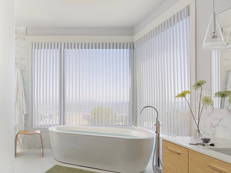 Luminette® Privacy Sheers let in filtered light when opened...